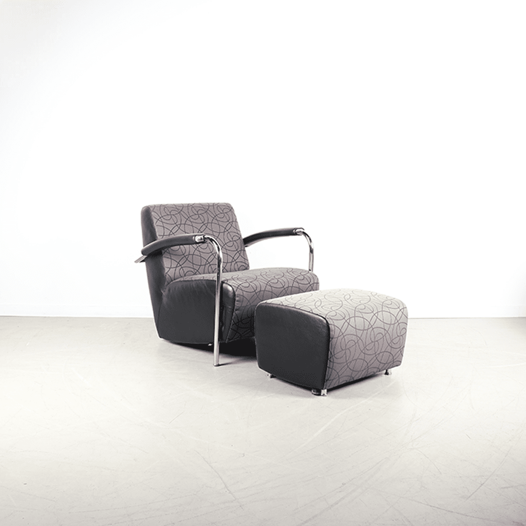 Leolux Scylla Laag Fauteuil Grijs Stof + Hocker
