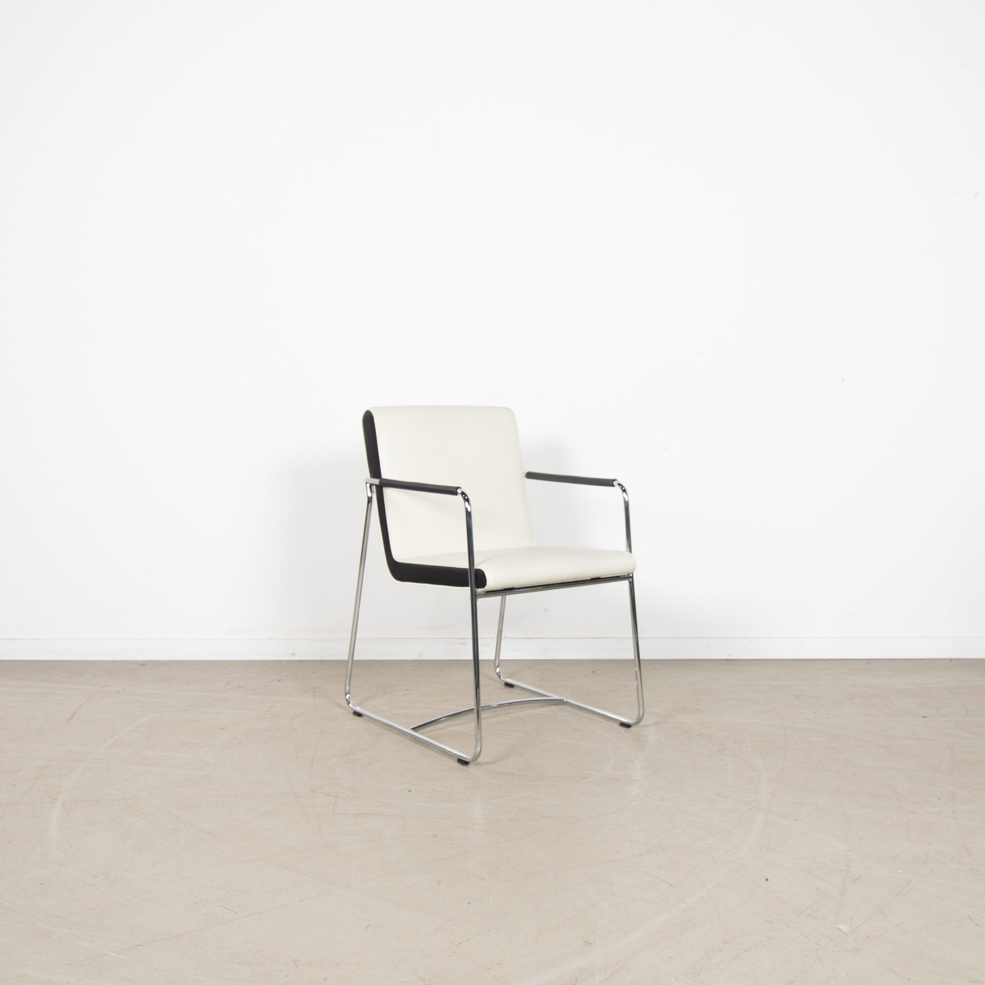 Leolux Spring Stoel Crème/Zwart Leer - Chroom
